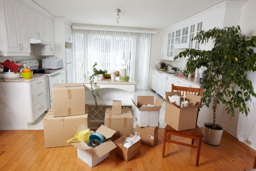 Assorted household furniture prepared for removal in a Southkensington flat