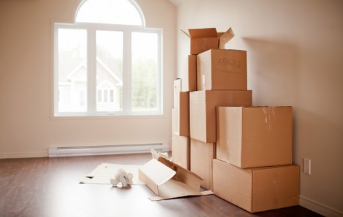 Man and van moving service in South Kensington street with residential buildings