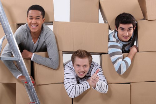 Packed moving boxes and wrapped household items ready for removals