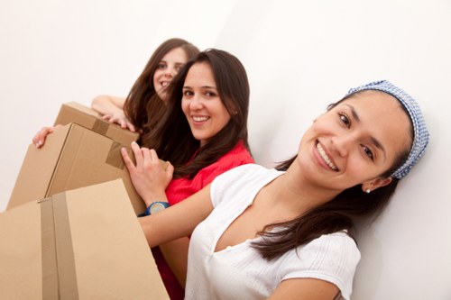 Professional team handling office equipment during a South Kensington move